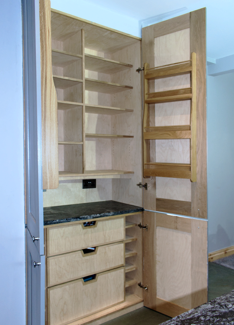 Left view of fitted kitchen pantry cupboard